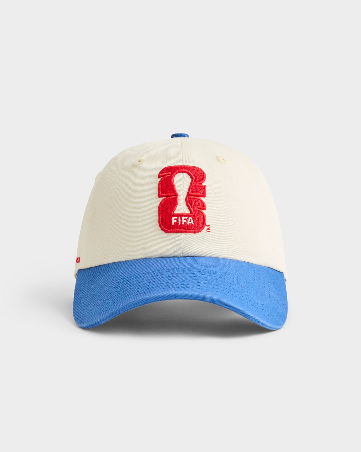 Atelier Sportif FIFA World Cup 26 two-tone cap in off-white and blue